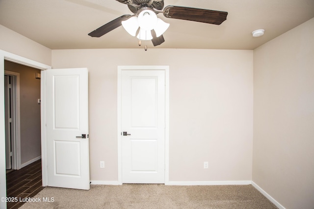 7314 29th St, Lubbock, TX 79407 - unfurnished bedroom featuring carpet floors and a ceiling fan