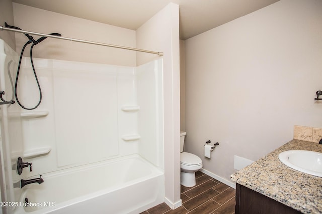 7314 29th St, Lubbock, TX 79407 - bathroom featuring wood tiled floors, vanity, and shower / washtub combination