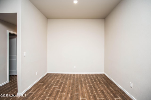 7314 29th St, Lubbock, TX 79407 - empty room with dark wood finished floors and recessed lighting