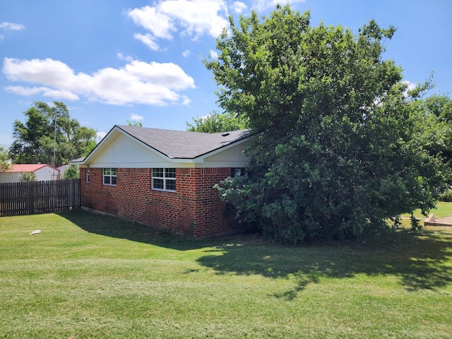 view of home's exterior featuring a lawn