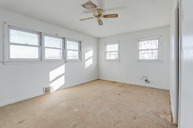 unfurnished room featuring ceiling fan