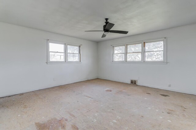 empty room featuring ceiling fan