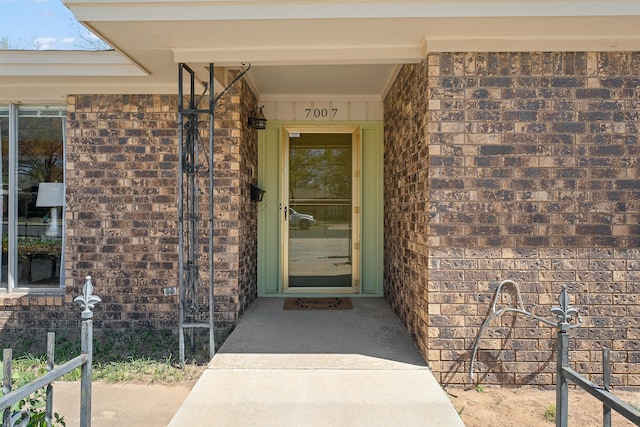 7007 Miami Ave, Lubbock, TX 79413 - property entrance with brick siding