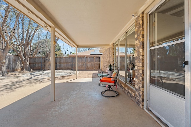 7007 Miami Ave, Lubbock, TX 79413 - fenced backyard featuring a patio
