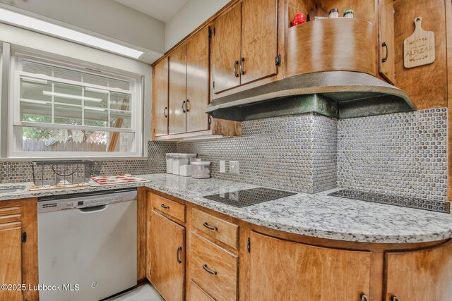 1901 31st St, Lubbock, TX 79411 - kitchen with stainless steel dishwasher, black electric cooktop, decorative backsplash, brown cabinets, and island range hood