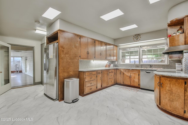 1901 31st St, Lubbock, TX 79411 - kitchen with stainless steel appliances, open shelves, light marble finish floors, tasteful backsplash, and plenty of natural light