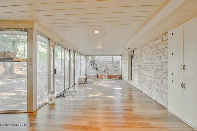 1901 31st St, Lubbock, TX 79411 - unfurnished sunroom with wood finished floors and wooden ceiling