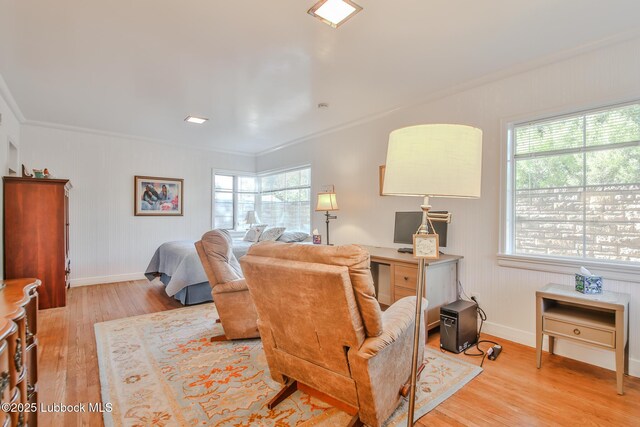 1901 31st St, Lubbock, TX 79411 - living area with light wood-type flooring, baseboards, and ornamental molding