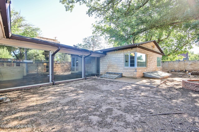 1901 31st St, Lubbock, TX 79411 - back of property with stone siding