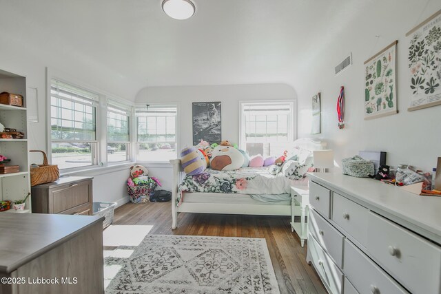 1901 31st St, Lubbock, TX 79411 - bedroom featuring dark wood-style floors and baseboards