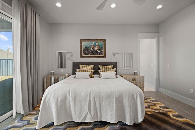 bedroom featuring baseboards, ceiling fan, wood finished floors, access to outside, and recessed lighting