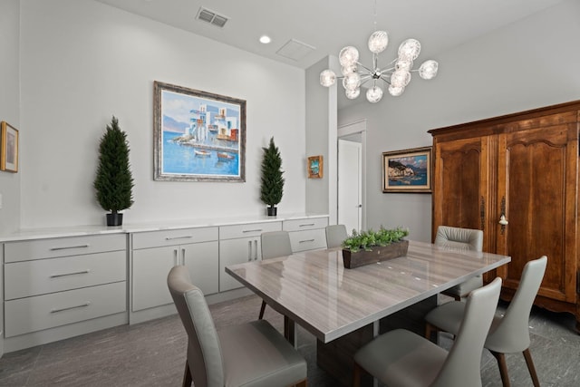 dining room featuring dark wood-style flooring, recessed lighting, visible vents, and a notable chandelier