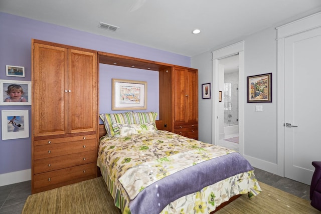 bedroom with recessed lighting, ensuite bath, visible vents, and baseboards