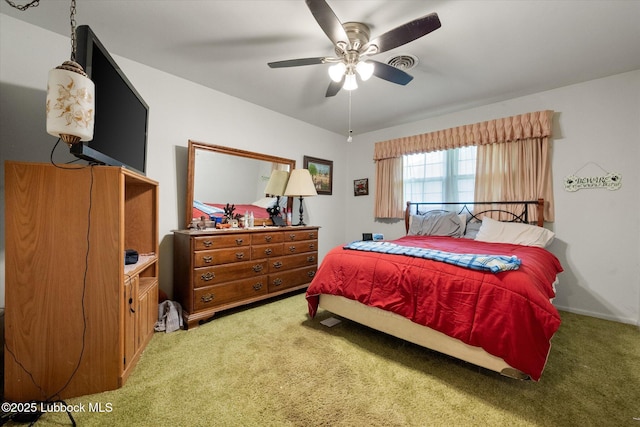 5426 28th St, Lubbock, TX 79407 - carpeted bedroom featuring a ceiling fan