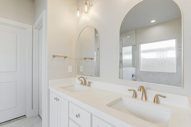 bathroom with vanity and walk in shower