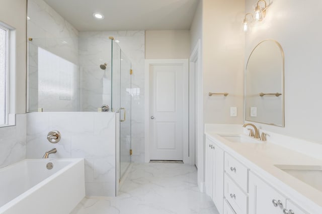 bathroom featuring independent shower and bath and vanity