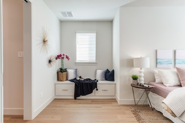 sitting room with light wood-type flooring