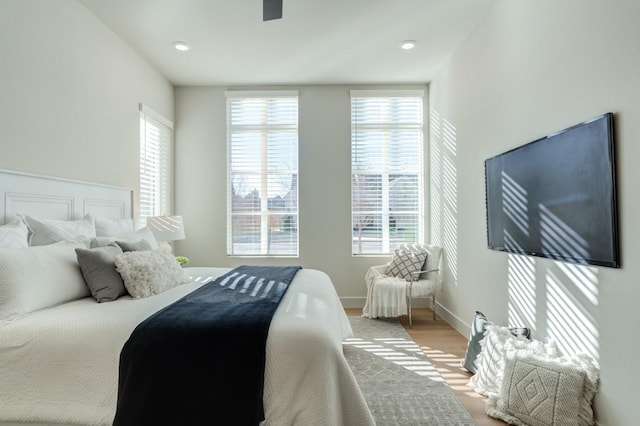 bedroom with light hardwood / wood-style floors