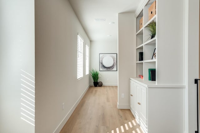 corridor featuring light wood-type flooring