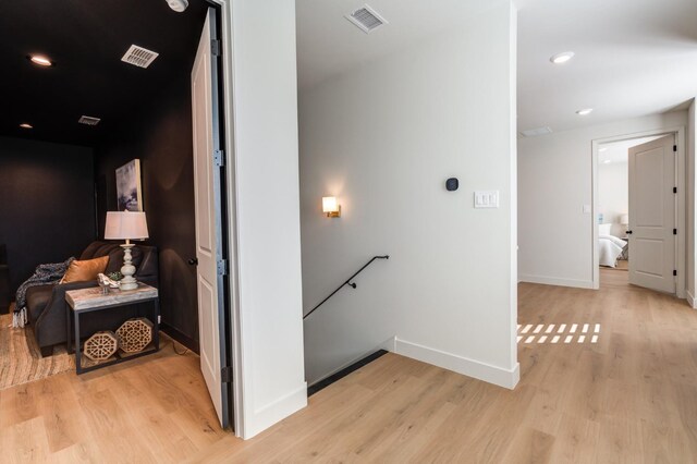 corridor featuring light hardwood / wood-style flooring