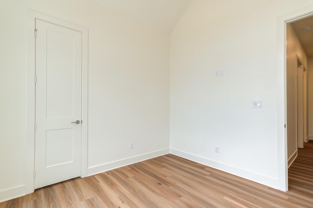 4610 138th Pl, Lubbock, TX 79424 - unfurnished room with light wood-style floors and vaulted ceiling