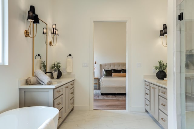 4610 138th Pl, Lubbock, TX 79424 - ensuite bathroom with vanity, a freestanding tub, marble look tiles, and a tile shower