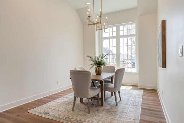 4610 138th Pl, Lubbock, TX 79424 - dining area featuring a chandelier, healthy amount of natural light, and wood finished floors