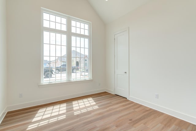 4610 138th Pl, Lubbock, TX 79424 - unfurnished room with light wood finished floors and high vaulted ceiling