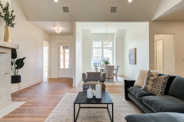 4610 138th Pl, Lubbock, TX 79424 - living room with a chandelier, wood finished floors, and recessed lighting