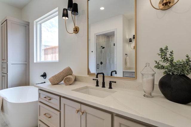 4610 138th Pl, Lubbock, TX 79424 - bathroom with plenty of natural light, vanity, a shower stall, a soaking tub, and recessed lighting