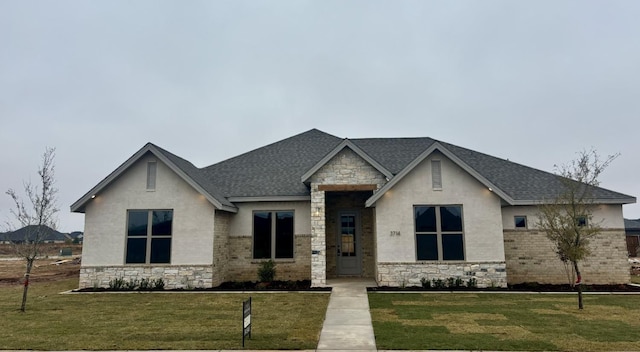 view of front of home with a front yard