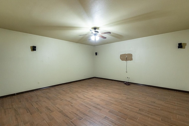 unfurnished room with ceiling fan and light hardwood / wood-style floors