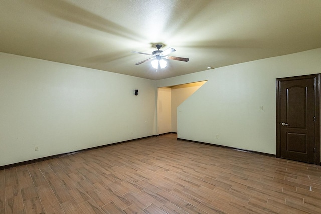 unfurnished room featuring light hardwood / wood-style floors and ceiling fan