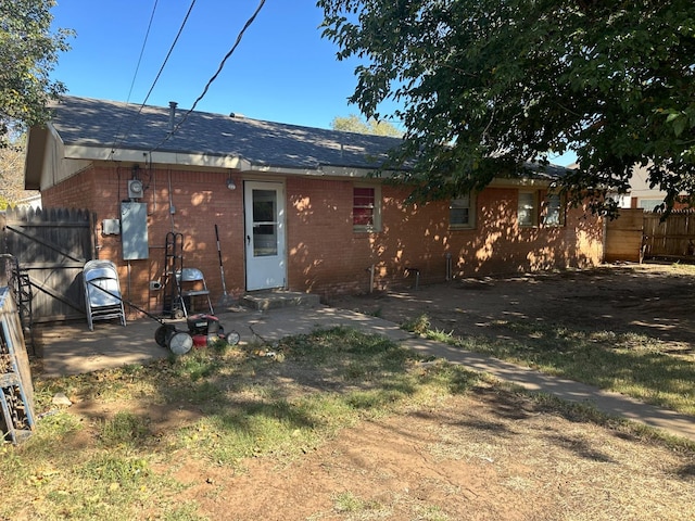 back of property featuring a patio