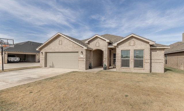 view of front facade with a garage and a front yard