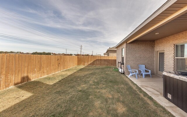 view of yard with a patio area