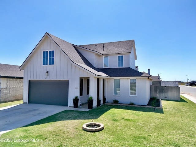1023 N Fulton Ave, Lubbock, TX 79416 - view of front of property with concrete driveway, board and batten siding, an attached garage, a shingled roof, and brick siding