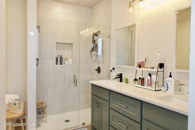1023 N Fulton Ave, Lubbock, TX 79416 - full bathroom featuring a shower stall and double vanity