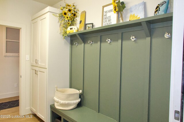1023 N Fulton Ave, Lubbock, TX 79416 - mudroom with light wood finished floors and baseboards