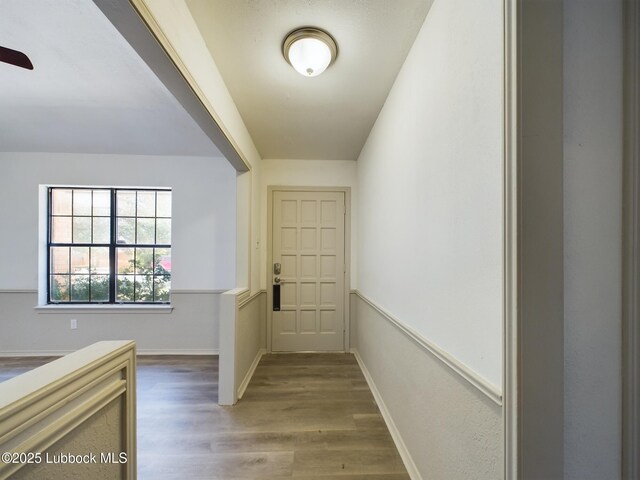 3419 101st St, Lubbock, TX 79423 - hall featuring wood finished floors and baseboards