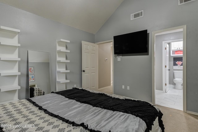9406 Wayne Ave, Lubbock, TX 79424 - bedroom featuring marble finish flooring, connected bathroom, and high vaulted ceiling