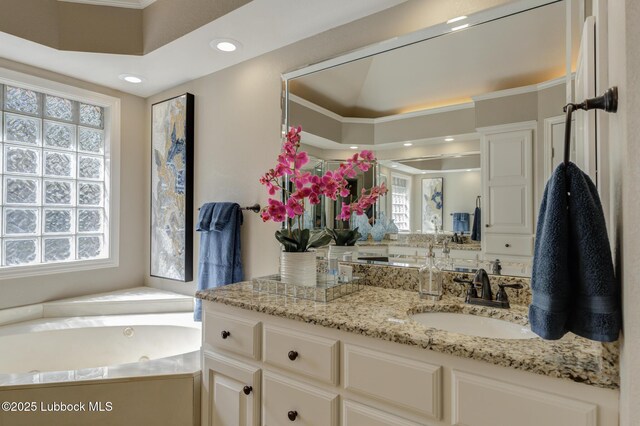 9406 Wayne Ave, Lubbock, TX 79424 - bathroom with vanity, a whirlpool tub, recessed lighting, and a shower with door