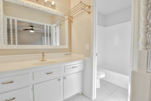 full bathroom with shower / tub combination, tile patterned flooring, vanity, ceiling fan, and toilet