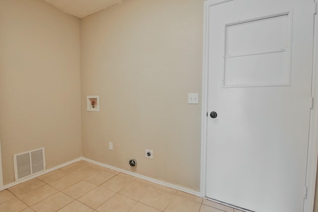 laundry room with hookup for a washing machine, light tile patterned flooring, and electric dryer hookup