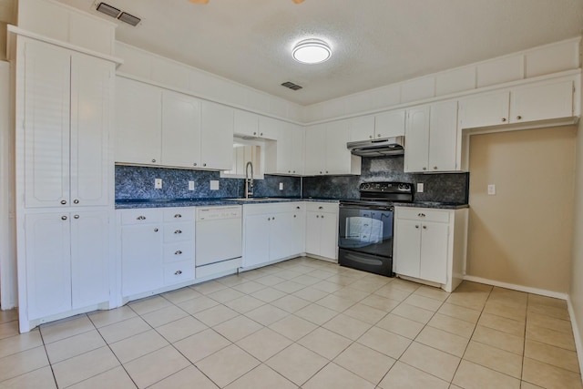 kitchen featuring white cabinetry, sink, backsplash, white dishwasher, and black electric range