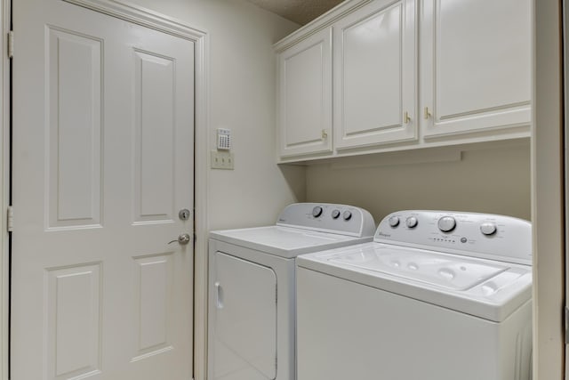 4107 101st St, Lubbock, TX 79423 - laundry area with washer and dryer and cabinet space