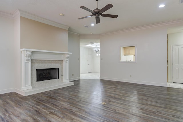 4107 101st St, Lubbock, TX 79423 - unfurnished living room with ornamental molding, ceiling fan, a premium fireplace, a chandelier, and wood finished floors