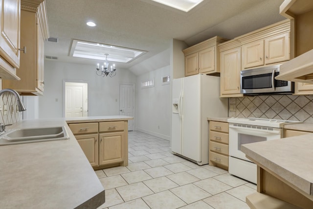 4107 101st St, Lubbock, TX 79423 - kitchen featuring white appliances, light brown cabinets, light countertops, tasteful backsplash, and a textured ceiling