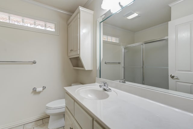 4107 101st St, Lubbock, TX 79423 - full bath featuring ornamental molding, vanity, a shower with shower door, plenty of natural light, and tile patterned flooring