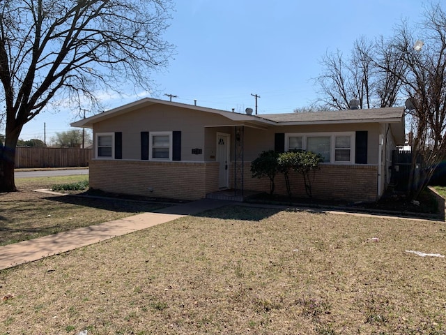 single story home with a front yard